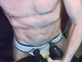Double Massage Gun stretch on table in underwear
