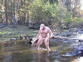Jerking off in the river.
