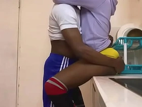 Horny African in kitchen fucking